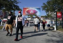 Baseball stadiums are filling up – but an analysis of the NFL’s 2020 season holds a warning about COVID-19 case spikes
