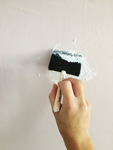 How to Create a Show-Stopping Accent Wall With Sparkly Glitter Paint