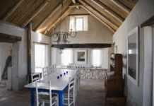 How to Insulate the Roof of an Exposed Beam Log Cabin