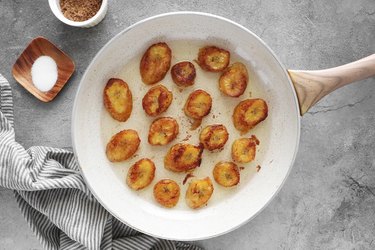 Cook the plantains until golden brown and crispy