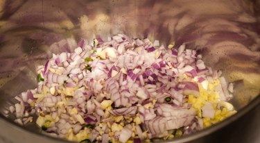 Saute vegetables on medium high heat.