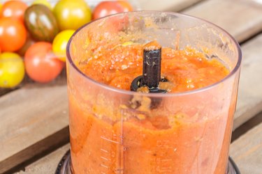 Puree vegetables in a blender