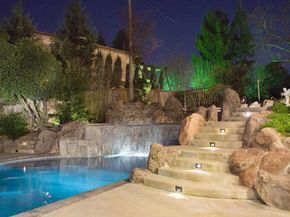 Landscape lighting will keep your yard safe -- and pretty to look at.