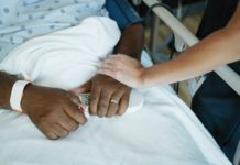 How doctors' fears of getting COVID-19 can mean losing the healing power of touch: One physician's story